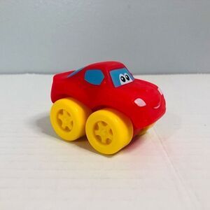 red car yellow wheels windshield eyes smile unmarked soft material 3 inch